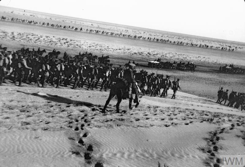 Q57770 Desert Column on way to El Arish. note separation between the camels, mules and men.l